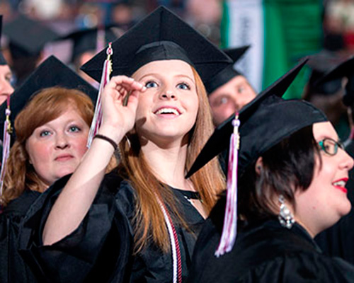 Photo of a student at graduation